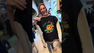 An orange bird Letterman&rsquo;s jacket now at Disney Springs