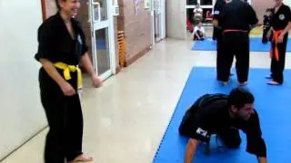 Rosa throwing Steve the Spartan at Scorpion Martial Arts