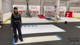 Coach Cathy on slide board at Extra Hour