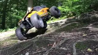 Axial Yeti XL bashing in the forest with mud