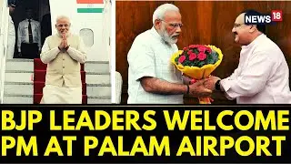 PM Modi News | JP Nadda & Other BJP Leaders Welcome PM Modi At Palam Airport | English News | News18