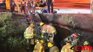 Fire crews rescue man from water filled ditch