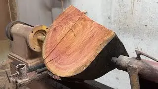 The Man Hand carved a Beautiful Wooden Bowl From a Piece of Firewood