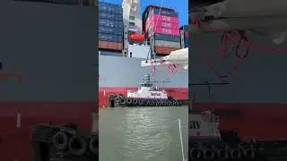 Big container ship sailing out of Port of Oakland, CA