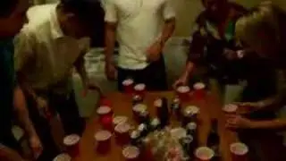 White kids playing Flip Cup