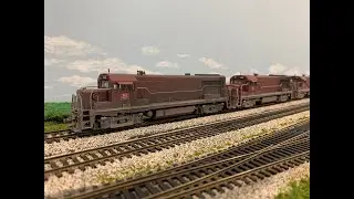 Rock Island U25B Locomotives Handle a Northbound Freight Train