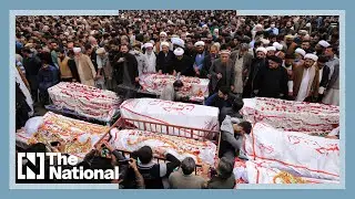Pakistanis mourn victims of mosque suicide bombing