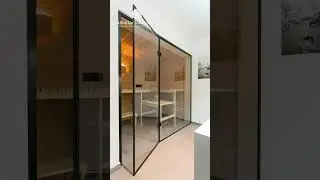 Modern sliding glass partition by satkartar glass solutions