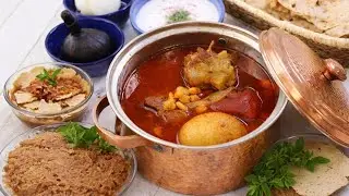 Village Lunch &mdash; Cooking Beef and Vegetables over Fire in the  house village 