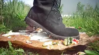 Timberland Boots food stomp, trample mozzarella, tomato pasta salad on plate