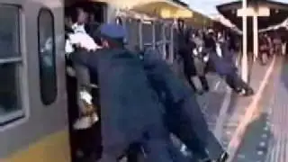 China or Japan people pushed into train