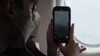 Cinematic Love Story Dramatic Role of Beautiful Asian Couples on Airplane Window Seats, Documenting