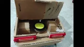 This is a  cardboard car I made myself. It has wheels and a cool look. I really enjoyed making it.
