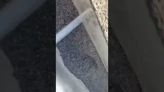 Shingle granules in gutter. Gutter clean out, pre house wash!