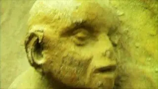 The cathedral (dark, mysterious piano and violin music) - with medieval demon statues.