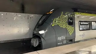 Züge am Münchner Flughafen mit Lufthansa 463,  Orangene Karriere S Bahn 