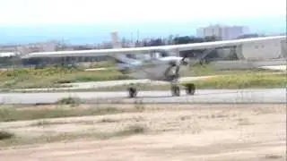 Cessna 152 landing in strong crosswind.