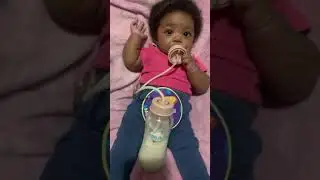 Lala trying the Hands free tinukim bottles