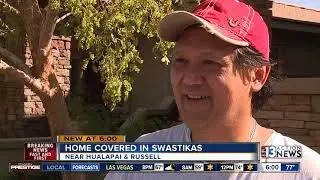Home covered in swastikas