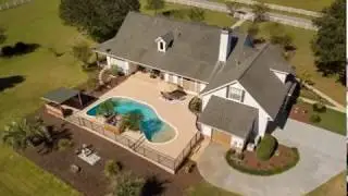 Beautifully-landscaped, custom ranch-style home on 2.97 acres in Micanopy, Florida.