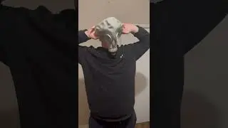 Putting on a GP-5 gas mask