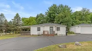 6894 Kuttshill Drive NE, Rockford, MI Presented by The Tracie Rich Team.