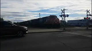 CN 3900 Leads A Northbound Power Move With A Safety Inspection Boxcar
