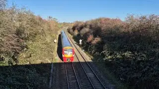 Watching trains from a country lane bridge. 