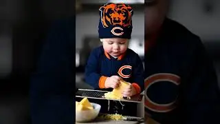 Chicago Bears baby fan grades Green Bay cheese.
