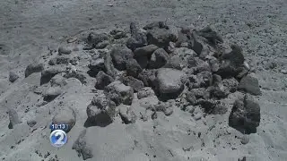 Beach bonfires can be hazardous long after the fire is out