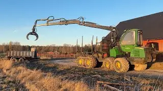 Köp Skotare John Deere 810 E på Klaravik