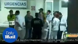 Emergency workers prep for survivors near Colombia crash site - Daily Mail