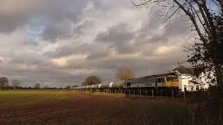 66793 BR Construction livery hauls the 6A32 full gas condensate tanks