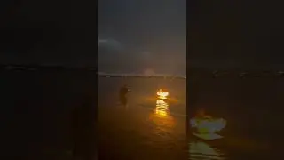 Fire spinning on a surfboard🔥🏄🏾&zwj;♂️