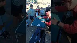 That&rsquo;s so cool! Coin magic on the Midway
