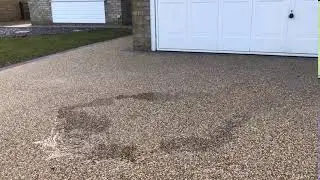 Watch the water disappear through our resin bound driveway.