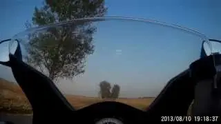 Quick ride (SJ1000 mounted on the tank of a Suzuki SV650S with the suction cup)