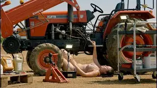The girl single-handedly repaired the industrial tractor, saving the entire crop for the farmer