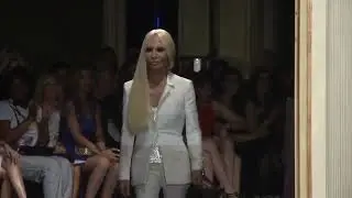 Donatella steps down as Versace design chief as sale talk swirls | REUTERS