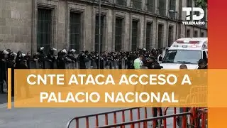 Maestros del CNTE se enfrentan a policías y rompen vidrios de Palacio Nacional tras reunión con AMLO