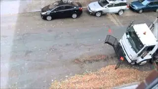 MONTREAL STREET CLEANER SWEEPING LEAVES