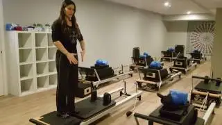 Standing Side Splits in Pilates Reformer Lane Cove