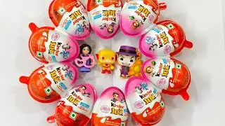 ASMR-style Kinder Joy unwrapping with cute surprise toys in a colorful circle. 🍫✨