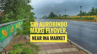 Magical walking tour on Sri Aurobindo Marg Flyover in drizzle. Near INA Market, New Delhi. #newdelhi