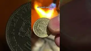 An old Dutch gold coin &mdash; a 10 Gulden piece &mdash; melted down in the crucible.