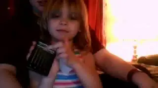 presley and tupeka playing the vdeo game guitar