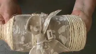 Altered Porter Bottle    Using Jute string   and embellishments