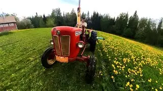 Little DAVID BROWN 880 mows the grass