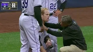 COL@MIL: Morneau gets hit in face, later exits game