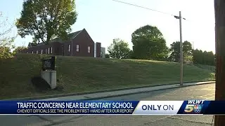 Neighbors hope for solution as city leaders look into after-school traffic concern
